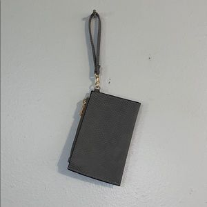 ⭐️ a new day grey and gold wristlet